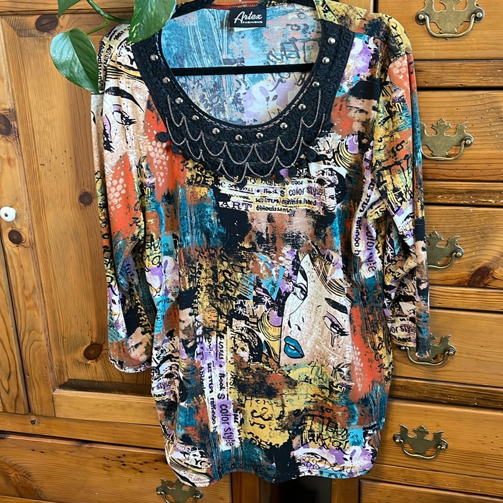 Artex Fashions 3/4 sleeved top with a fancy neckline